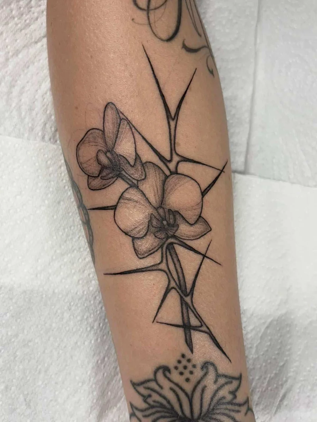 Tattoo and piercing work by Boys Don't Cry Camden studio