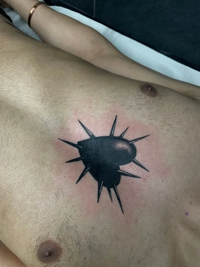 Tattoo and piercing work by Boys Don't Cry Camden studio