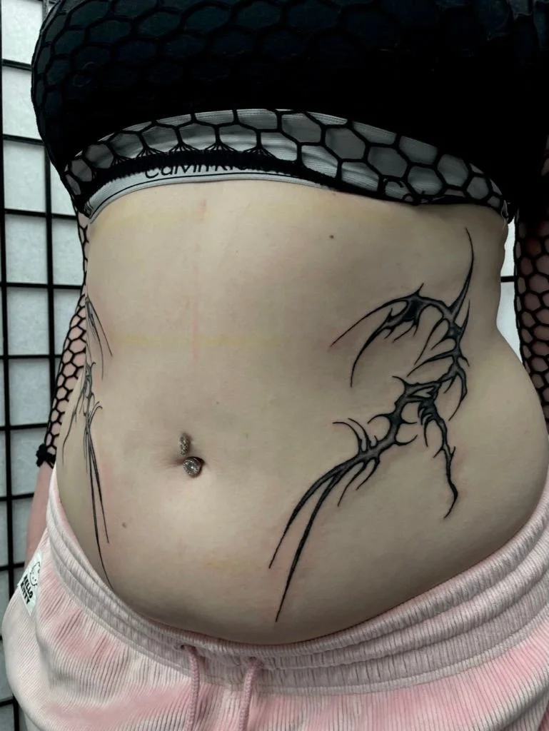 Tattoo and piercing work by Boys Don't Cry Camden studio