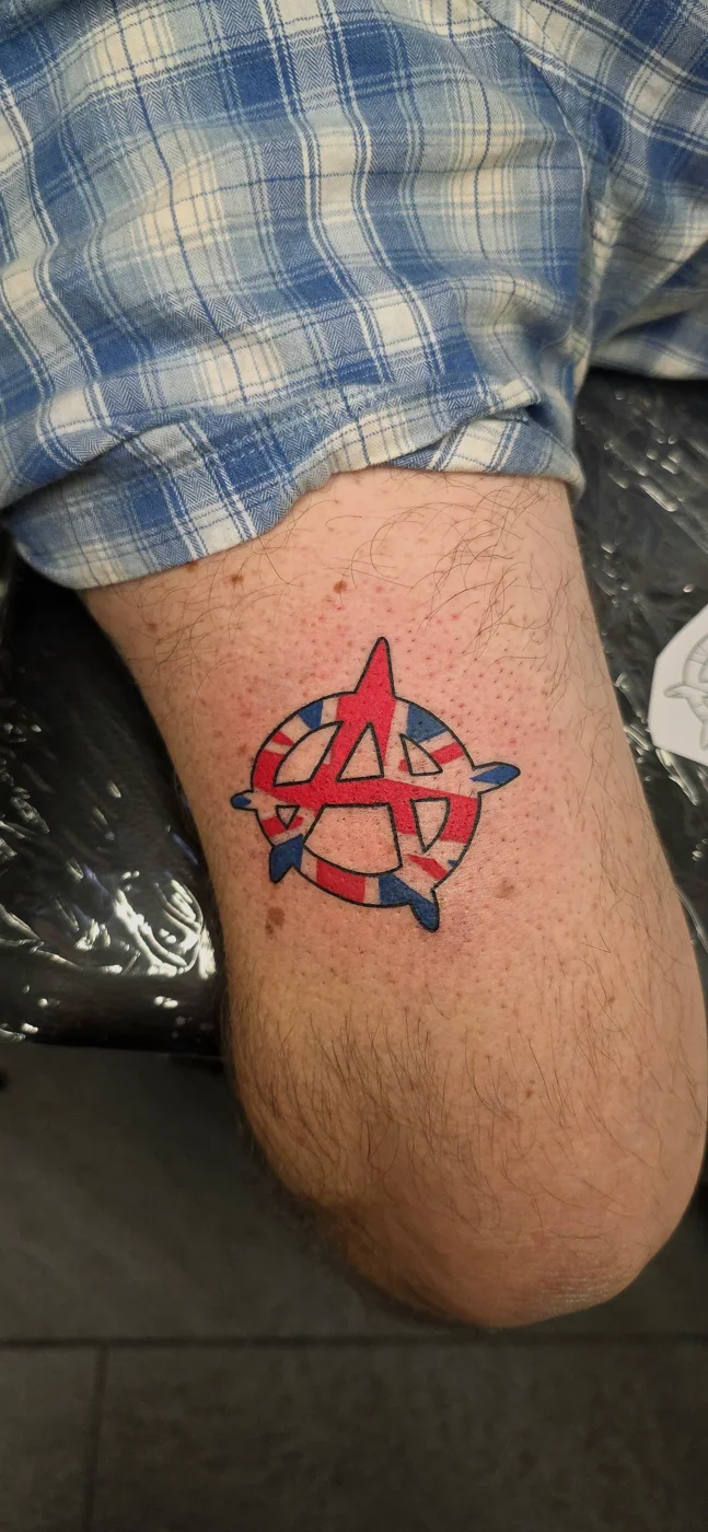 Tattoo and piercing work by Boys Don't Cry Camden studio