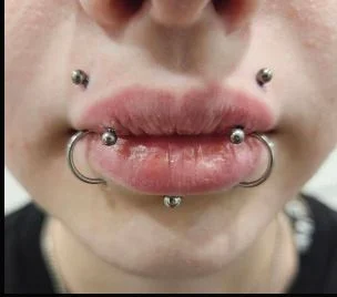 Tattoo and piercing work by Boys Don't Cry Camden studio